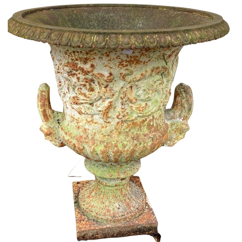 1372 - A large 19th Century cast iron Garden Urn, of campana form with tongue and dart folded rim over a le... 