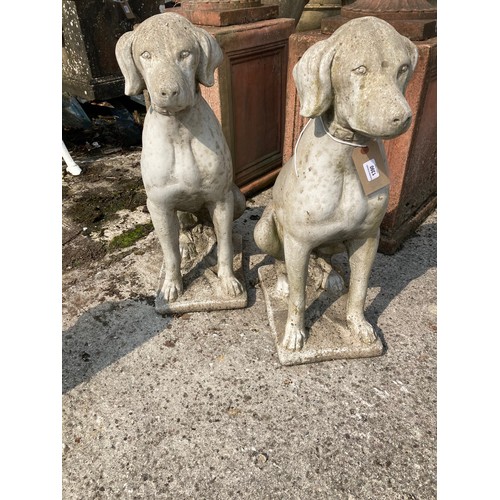 1390 - A pair of attractive composition Statues of seated Dogs, each approx. 71cms (28'')h. (2)... 