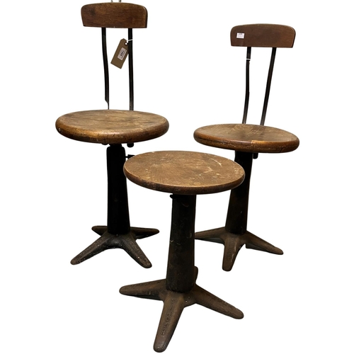 1395 - A set of early 4 Edwardian metal Factory Workers Chairs, each with heavy mahogany circular seats, an... 