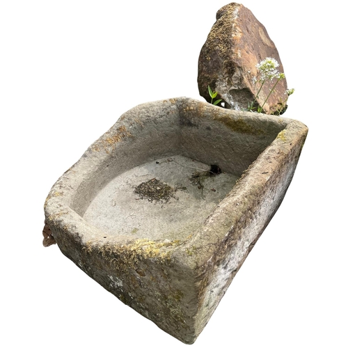 1400 - A small 19th Century granite Water Trough, of natural shape, 63cms x 61cms (25