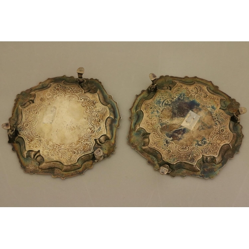 40 - A pair of George II silver Card Trays or small Salvers, by J. McFarlane, London 1752, each chased wi... 