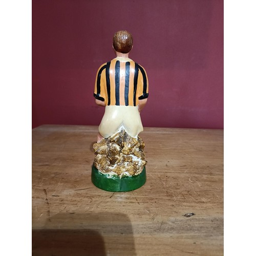 372 - G.A.A.: A hand painted plaster Figure of a hurler 