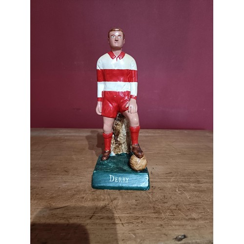 377 - G.A.A.: a hand painted plaster Figure of a Footballer 