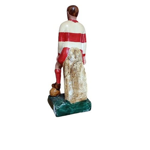 377 - G.A.A.: a hand painted plaster Figure of a Footballer 