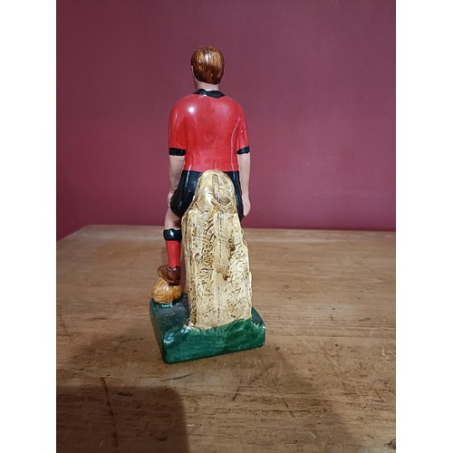 379 - G.A.A.: a hand painted plaster Figure of a Footballer 