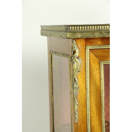 818 - An early 20th Century French Verni Martin style brass mounted Vitrine, the three-quarter gallery aro... 