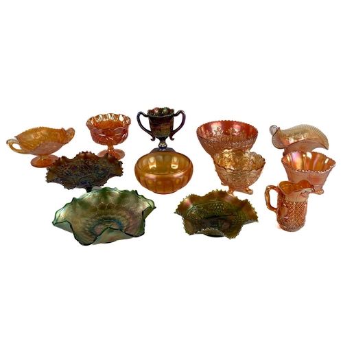 1036 - A collection of colourful moulded Carnival Glass, comprising various bowls, dishes, vase and ju... 