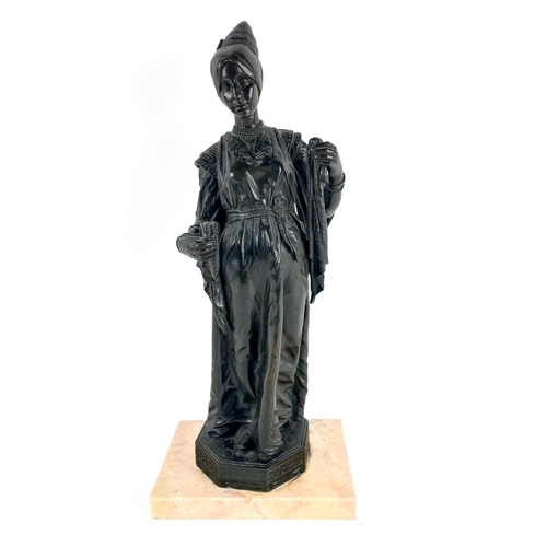 1038 - A late 19th Century bronze Figure, of a Medieval Lady wearing a long dress, a bead necklace and a lo... 