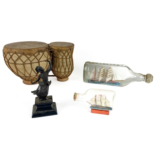 1044 - A three mast Ship, with full sails, in a glass Teachers Whiskey Bottle, 30.5cms (12