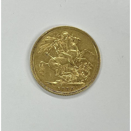 200 - Coins: An 1889 Queen Victoria full Sovereign, (some wear) otherwise good. (1)... 