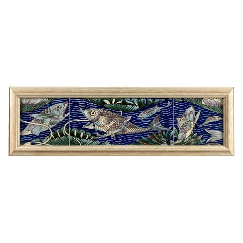 438 - After William de Morgan (1839-1917)A set of four Persian Fish Frieze Tiles, mounted and framed, appr... 