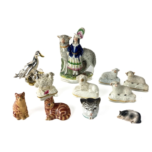 822 - A Staffordshire Group, modelled with Woman and a Sheep as is, 20cms (8