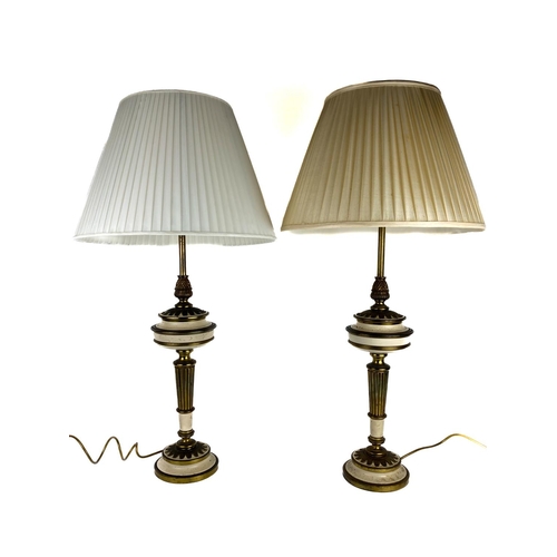 1071 - A pair of brown patinated bronzed metal Table Lamps, each stem with two star moulded knops on square... 