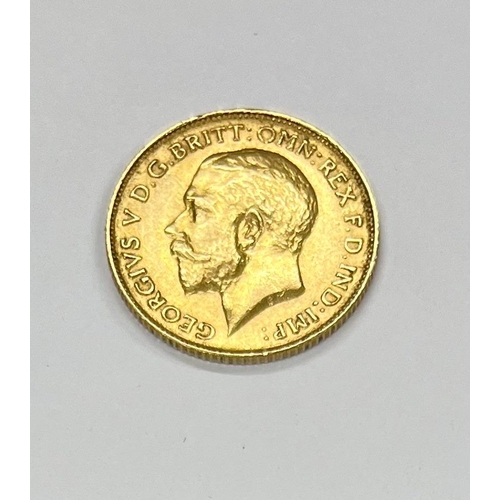 202 - Coins: A 1913 King George V half Sovereign, good. (1)... 