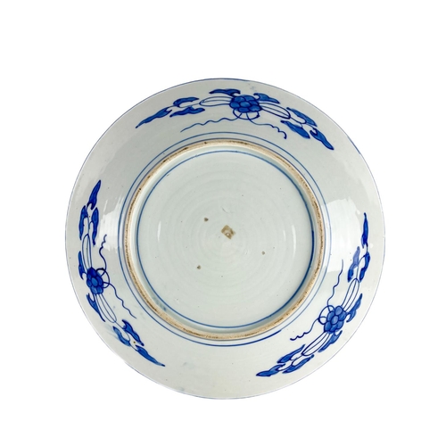 275 - A large 20th Century blue and white Japanese 'fish' Platter, decorated with water plants, approx. 46... 