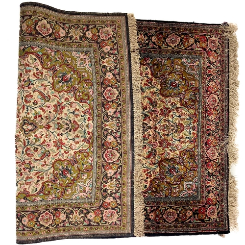 725 - A very attractive Persian Ghom Rug, with centre diamond medallion and colourful floral field and con... 