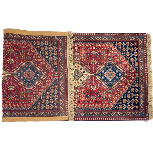 728 - A fine burgundy ground Persian short Runner, with a row of five diamond shaped medallions on a styli... 