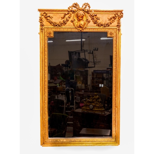 946 - A very good mid-19th Century carved giltwood Overmantel Mirror, crested with a ribbon bow issuing fl... 