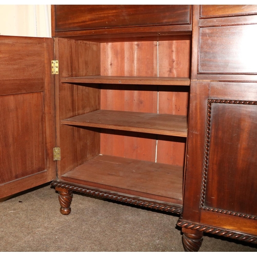 959 - A fine quality and unusual Irish George IV period, possibly Cork,  mahogany breakfront Secretaire Bo... 