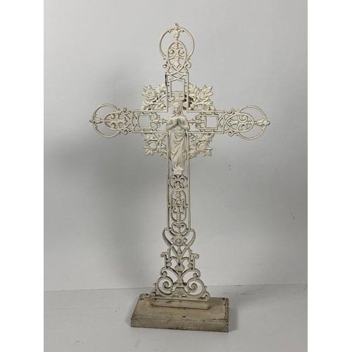 443 - A fine pierced cast metal Cross, with an image of the Virgin Mary to either side inside an arrangeme... 