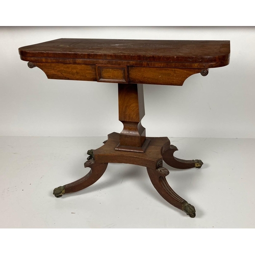 685 - A Regency period mahogany and crossbanded fold-over Card Table, with panelled frieze on two stage ta... 