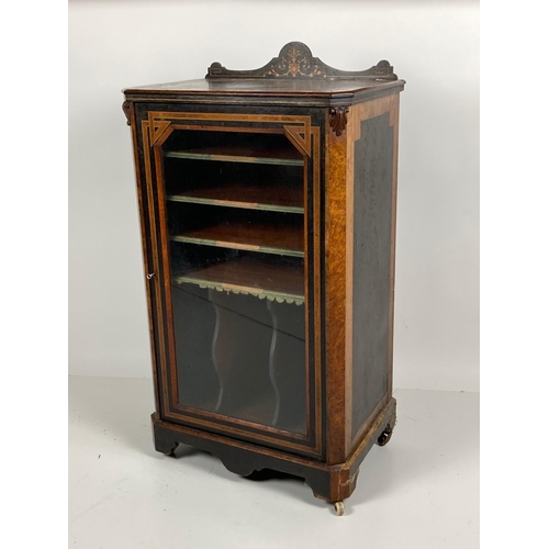 702 - A Victorian ebonised and birds-eye-maple Music Cabinet, inlaid and crossbanded with a glazed door en... 