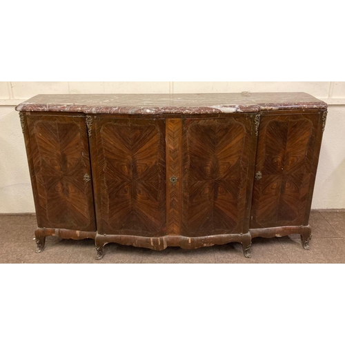 707 - A large French Side Cupboard, of serpentine form, with heavy moulded rouge and speckled marble top a... 