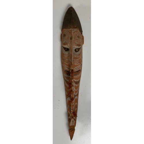 257 - A rare old carved wooden and decorated Mask, probably Papua New Guinea, Sepik River, decorated in ir... 