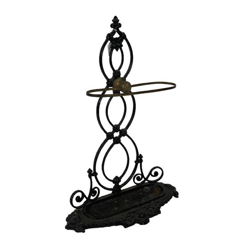 1066 - A late Victorian cast iron Stick and Umbrella Stand, with brass rail, 74cms x 50cms (29