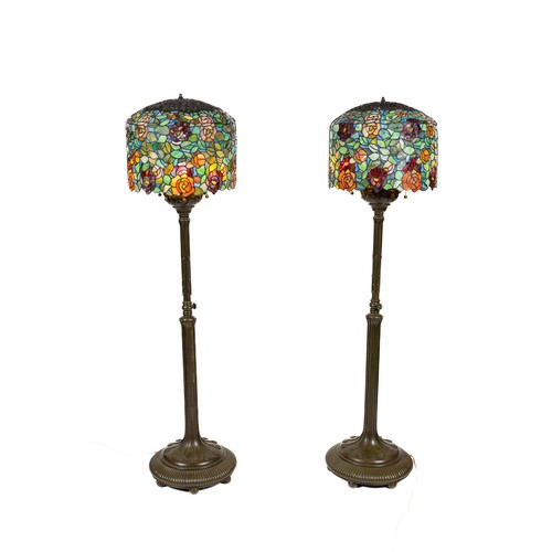 1106 - A very attractive and colourful pair of tall Tiffany style Floor or Standard Lamps, with bronzed fin... 