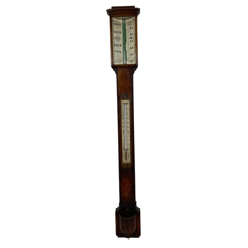 653 - A quality 19th Century Irish mahogany Stick Barometer, the rectangular glazed top with stamped capit... 