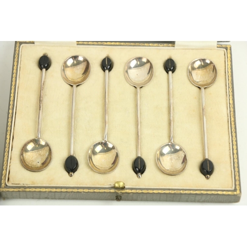 20 - A cased set of 6 silver Coffee Spoons, Sheffield 1922, each with coffee bean finial, together with a... 