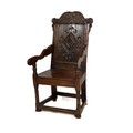 [Jonathan Swift] An important 17th Century Wainscot oak Armchair, c. 1680, the back with ornate carv... 