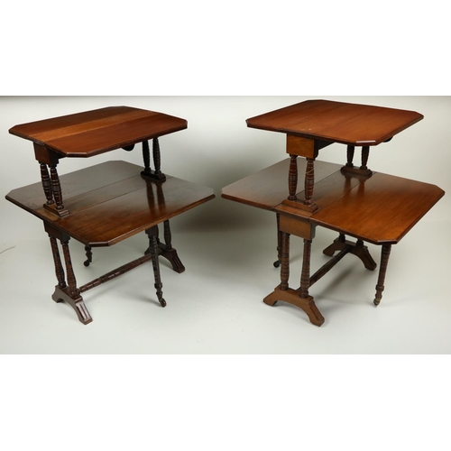 25 - An unusual pair of Edwardian walnut two tier Sutherland Tables, each tier with two rectangular flaps... 