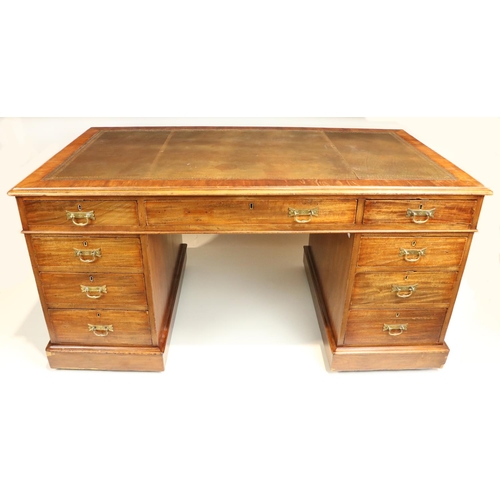 72 - A rectangular Victorian style pedestal Desk, in the manner of Jas. Shoolbred & Co., the moulded ... 