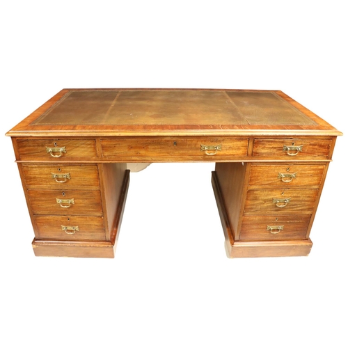 72 - A rectangular Victorian style pedestal Desk, in the manner of Jas. Shoolbred & Co., the moulded ... 