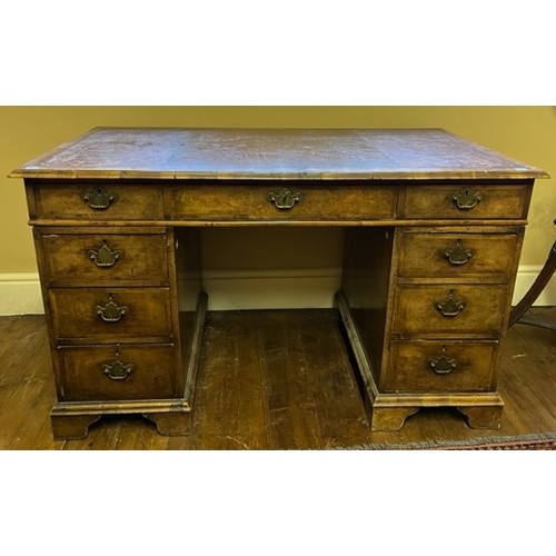 103 - A quality 19th Century walnut pedestal Desk, of small proportions, the leather inset top with moulde... 