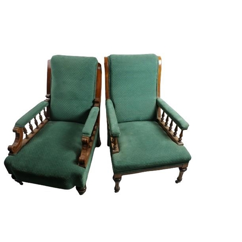 80 - A Biedermeier type Armchair, of low proportions in satin mahogany with carved rails and legs, and a ... 