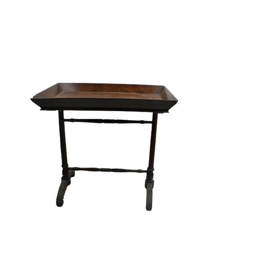 86 - A fine quality Irish mahogany William IV tray top Table, united by turned stretchers, on carved leaf... 