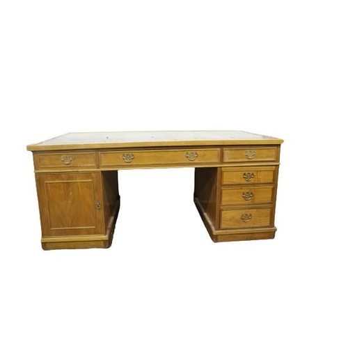 89 - A Georgian style kneehole partners pedestal Desk, with tooled leather inset top, with frieze drawers... 