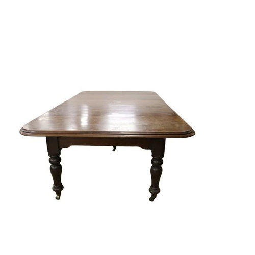 95 - A fine quality Irish mahogany Dining Table, in the manner of Strahan, the moulded top with three spa... 