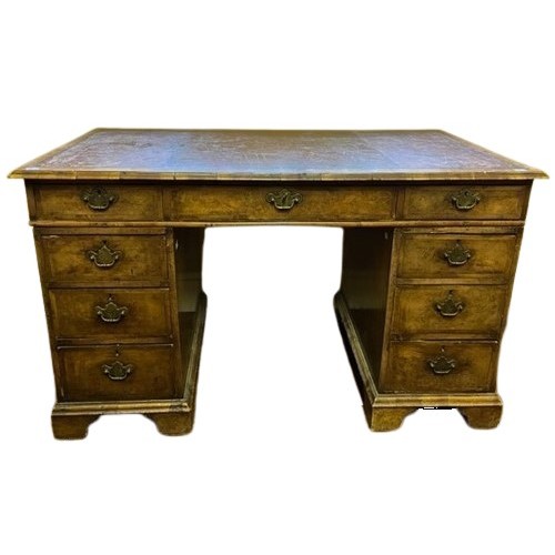 103 - A quality 19th Century walnut pedestal Desk, of small proportions, the leather inset top with moulde... 