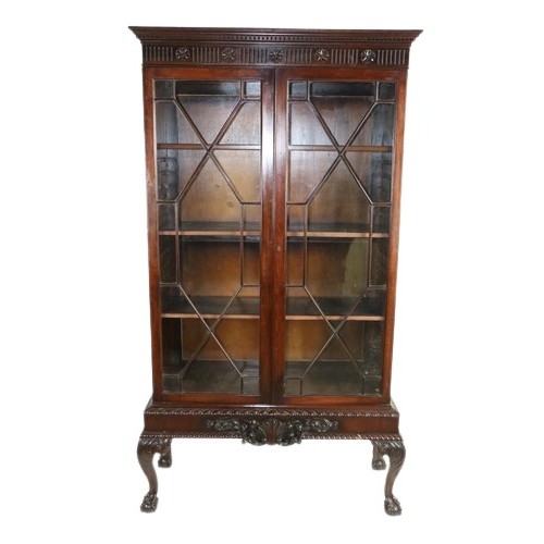 23 - A mahogany Display Cabinet, in the Chippendale style, 20th Century, the dentil moulded cornice above... 