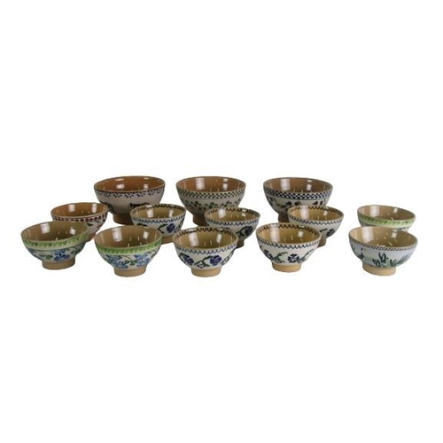 399 - Three large varied design Nicholas Mosse pottery Bowls, (cow, blueberry, and red berry), a set of fi... 