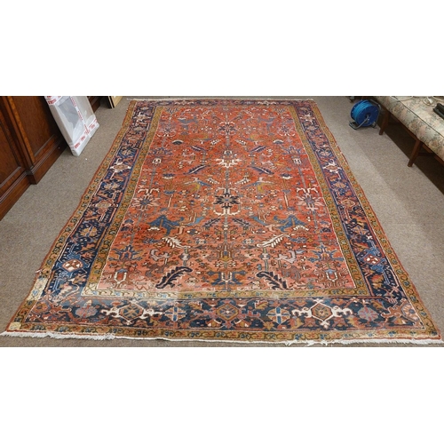 413 - A fine quality semi-antique heavy woollen Carpet, the central panel on burgundy ground with floral a... 