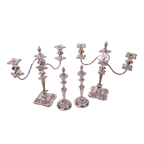 1 - A pair of Victorian silver plated two branch three light Candelabra, of embossed design, with matchi... 