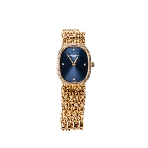 A Ladies Patek Philippe 18ct gold Wrist Watch, the sapphire and face set with four diamonds on the face, with rope design hand, the edge set with 52 diamonds, .52tcw, the bracelet of chain mail design with cross over clasp, in original leather service purse. (1)