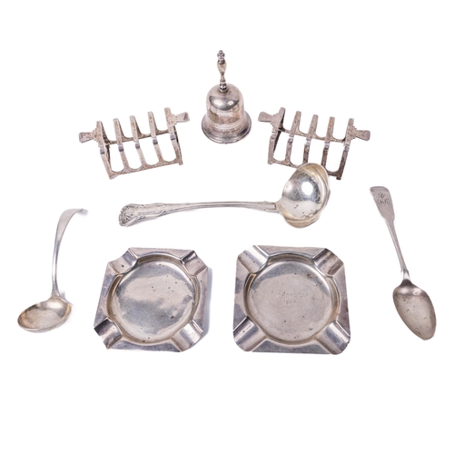 26 - A pair of English silver Art Deco miniature Toast Racks, by Mappin & Webb, a silver Calling Bell... 