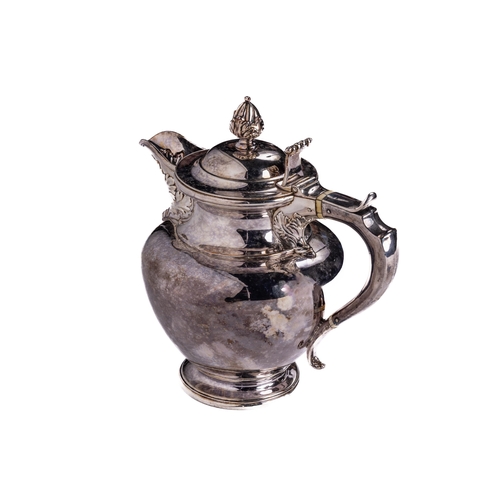 28 - Silverware: A fine quality silver plated Victorian Water Jug, with domed hinged lid shaped finial, i... 