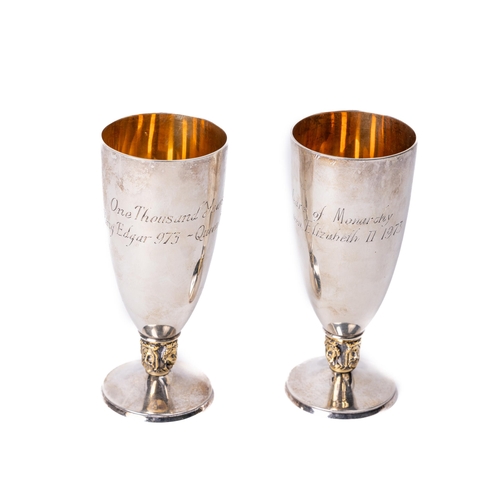 58 - A pair of Commemorative silver gilt Goblets, 